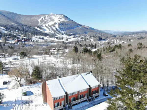 a view of a house with a big yard