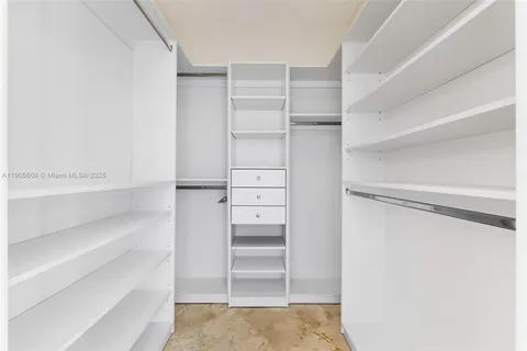 a bathroom with a toilet and a bathtub