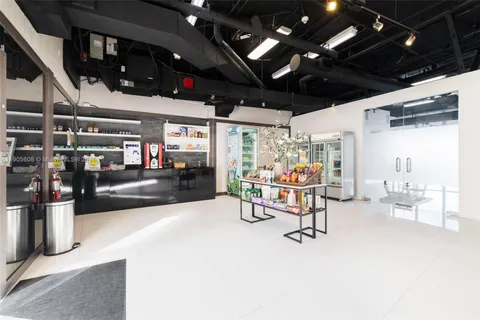 a swimming pool with outdoor seating and yard