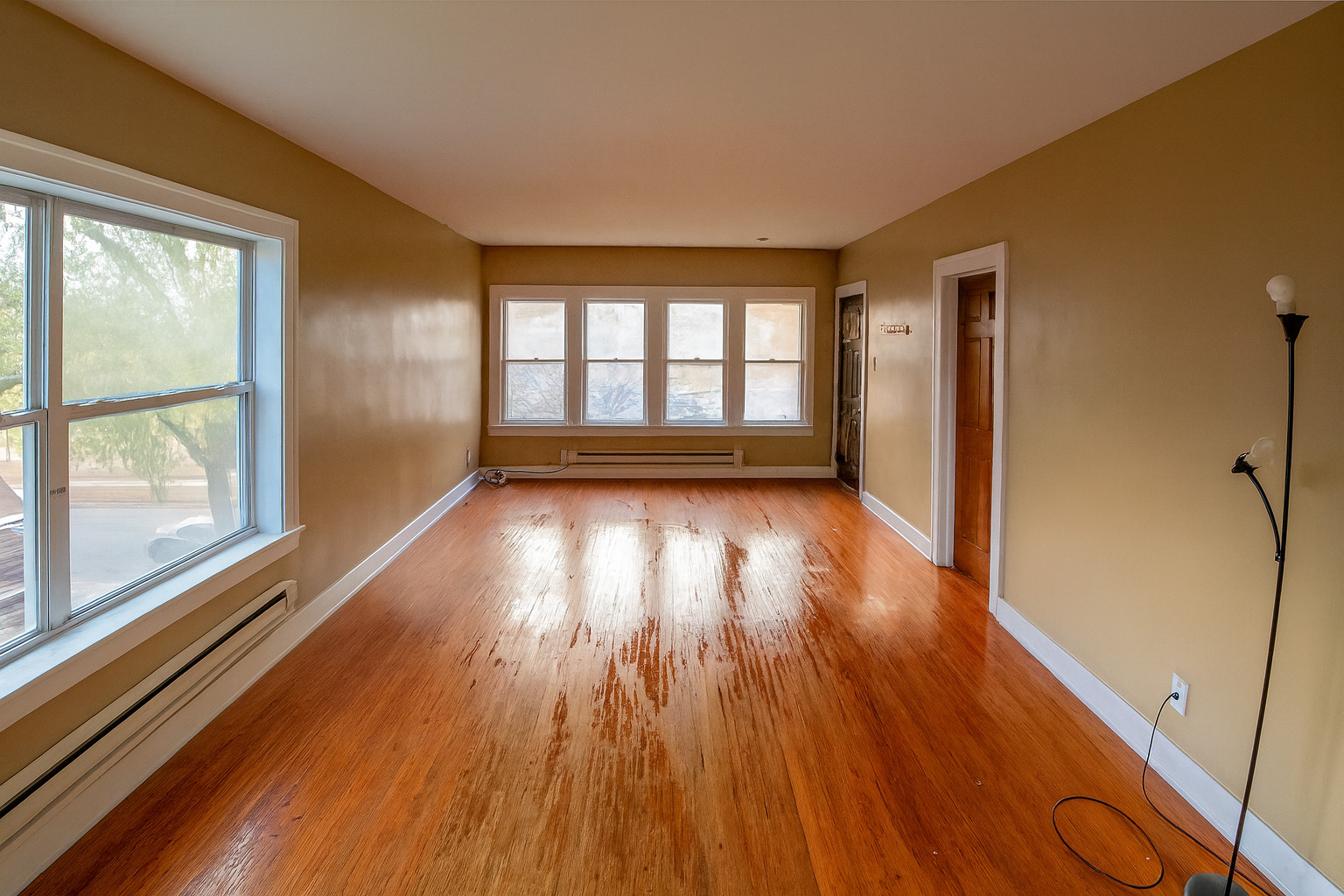 910 Nicholson Street Joliet, IL 60435 - Photo 18 of 30 wooden floor in an empty room with a window