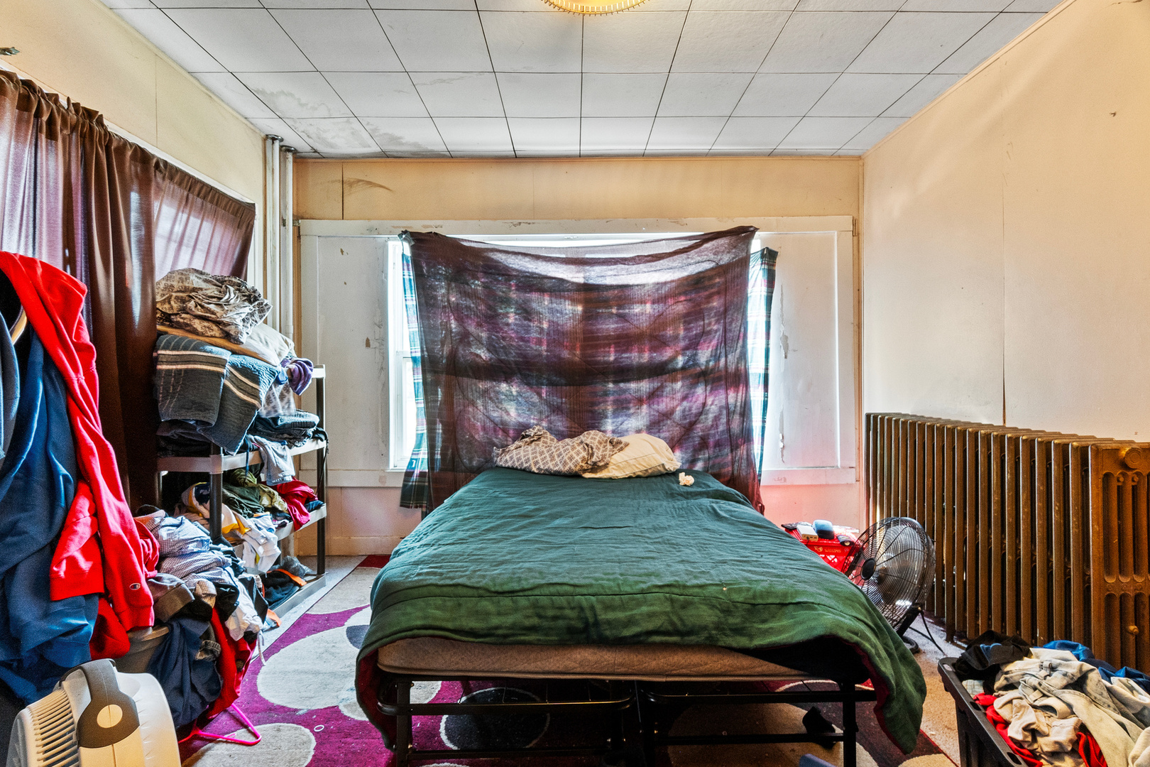 910 Nicholson Street Joliet, IL 60435 - Photo 7 of 30 a bed room with a bed and a store