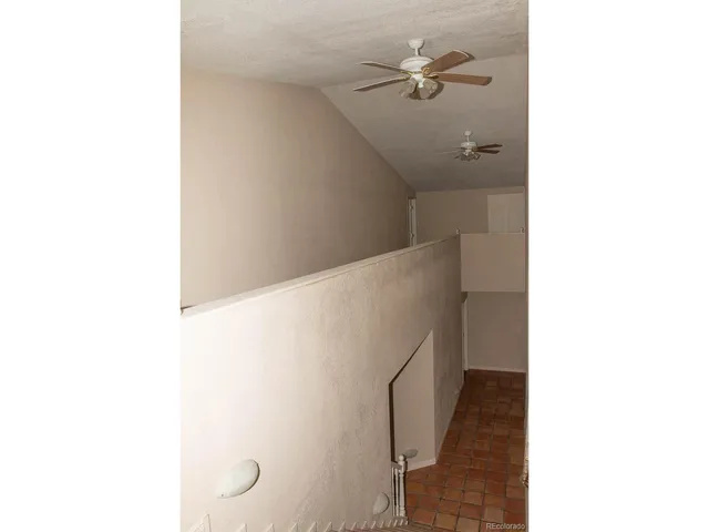 a view of a kitchen from the hallway