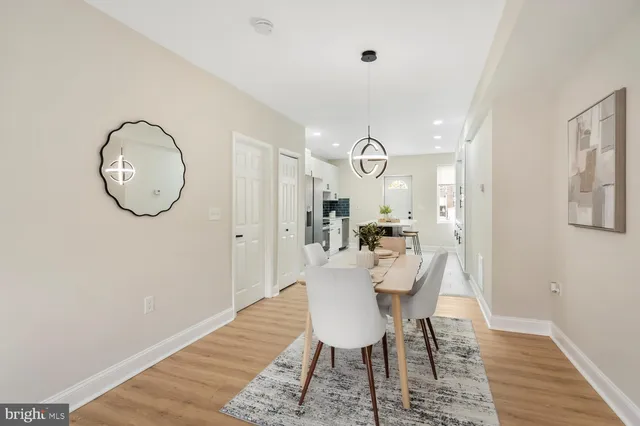 a view of dining room and wooden floor