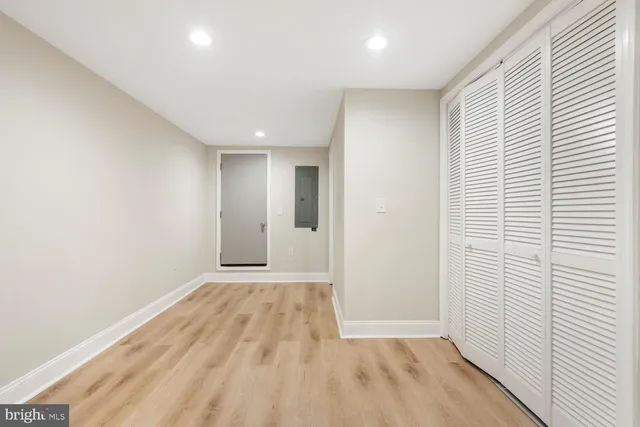 a view of a livingroom with wooden floor