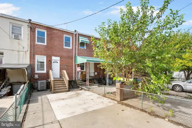 a building with trees in front of it