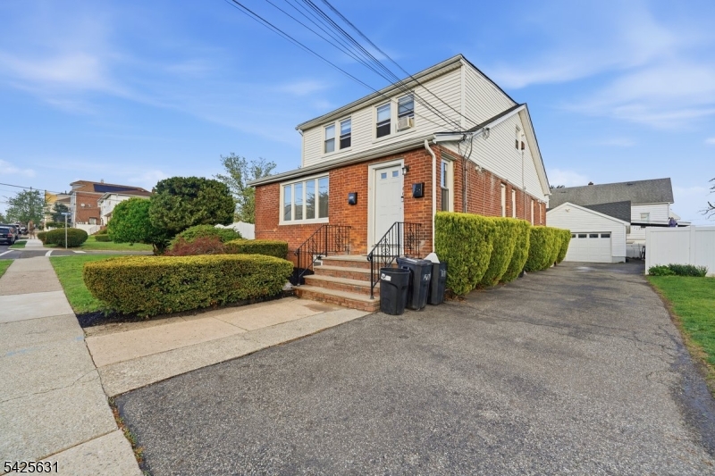 60 Westervelt Place Lodi, NJ 07644 - Photo 5 of 48 a view of a house with a street