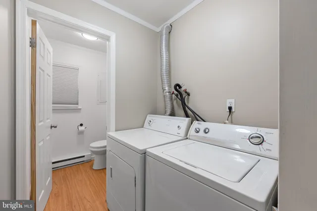 a utility room with dryer and washer