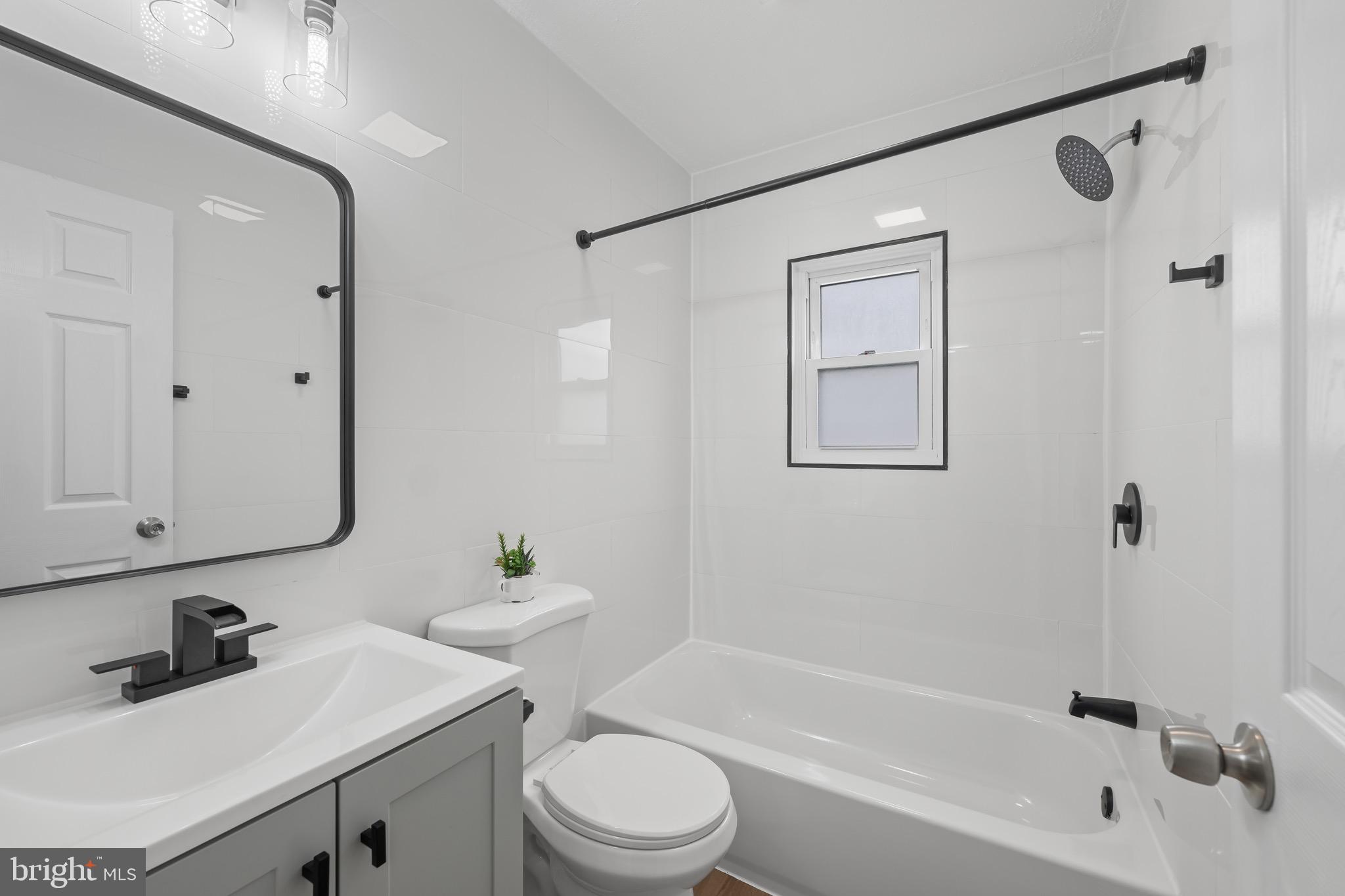 163 East 2nd Street Alburtis, PA 18011 - Photo 26 of 30 a bathroom with a sink toilet and shower