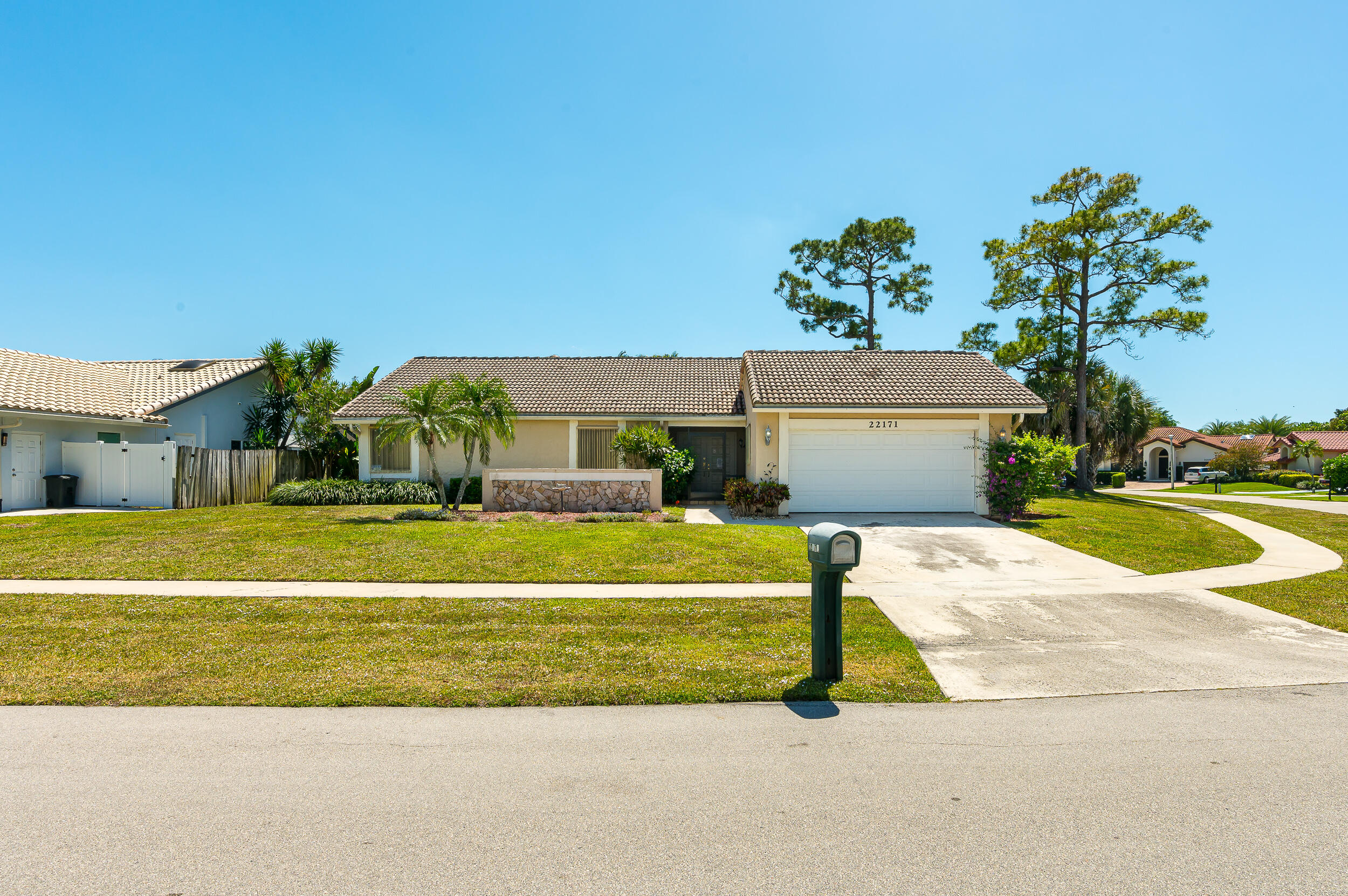 22171 Hollyhock Trail Boca Raton, FL 33433 - Photo 3 of 19 a view of swimming pool with a yard