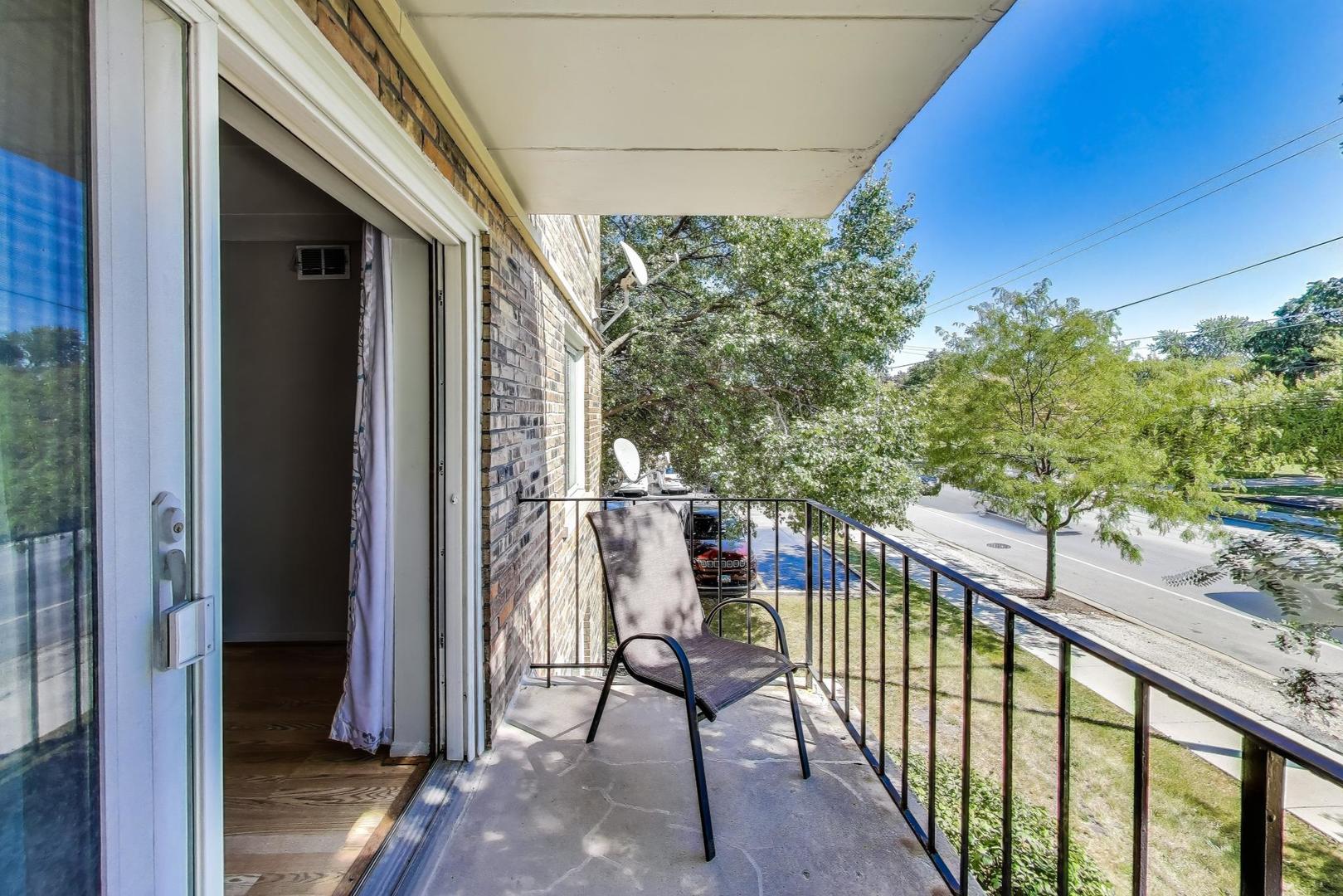3838 West 111th Street, Unit 209 Chicago, IL 60655 - Photo 13 of 16 a view of balcony with furniture