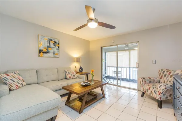 a living room with furniture and a window
