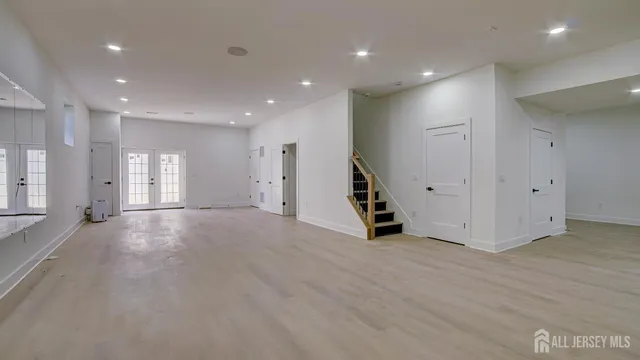 a front view of a house with yard and green space