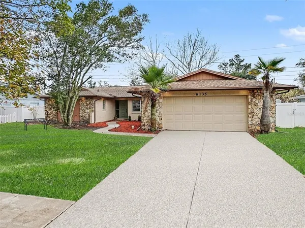 a front view of house with yard