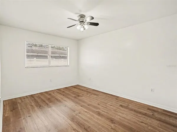 a bathroom with a sink vanity and mirror