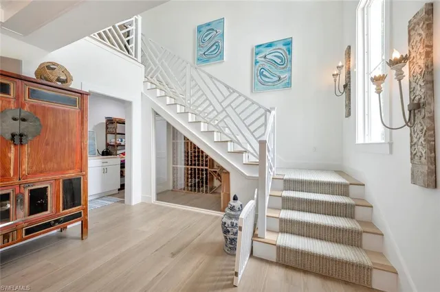 a view of an entryway with wooden floor