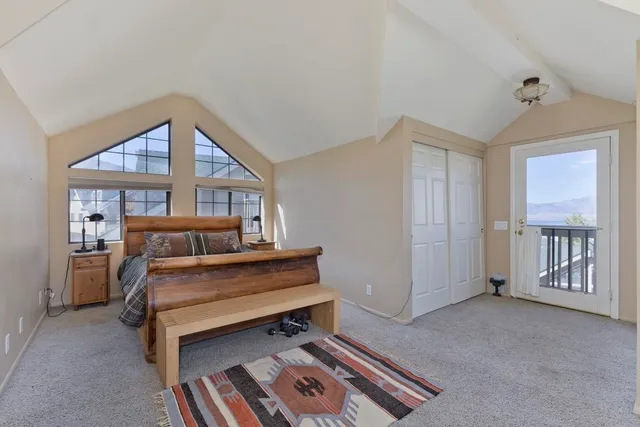 a bedroom with furniture and window