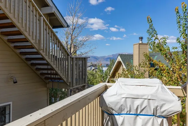 a view of balcony with furniture
