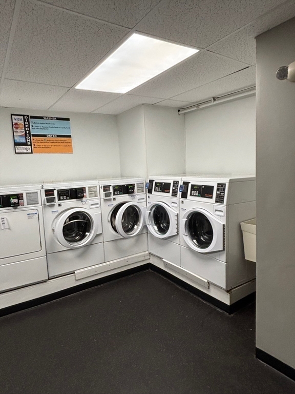 50 Broadway, Unit 47 Beverly, MA 01915 - Photo 10 of 10 a white stove top oven sitting inside of a kitchen