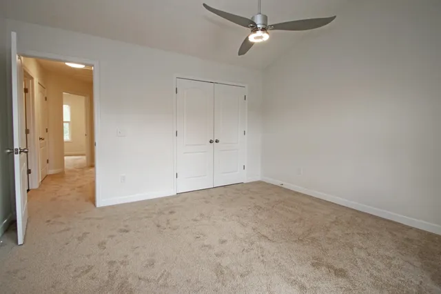 an empty room with a bathroom