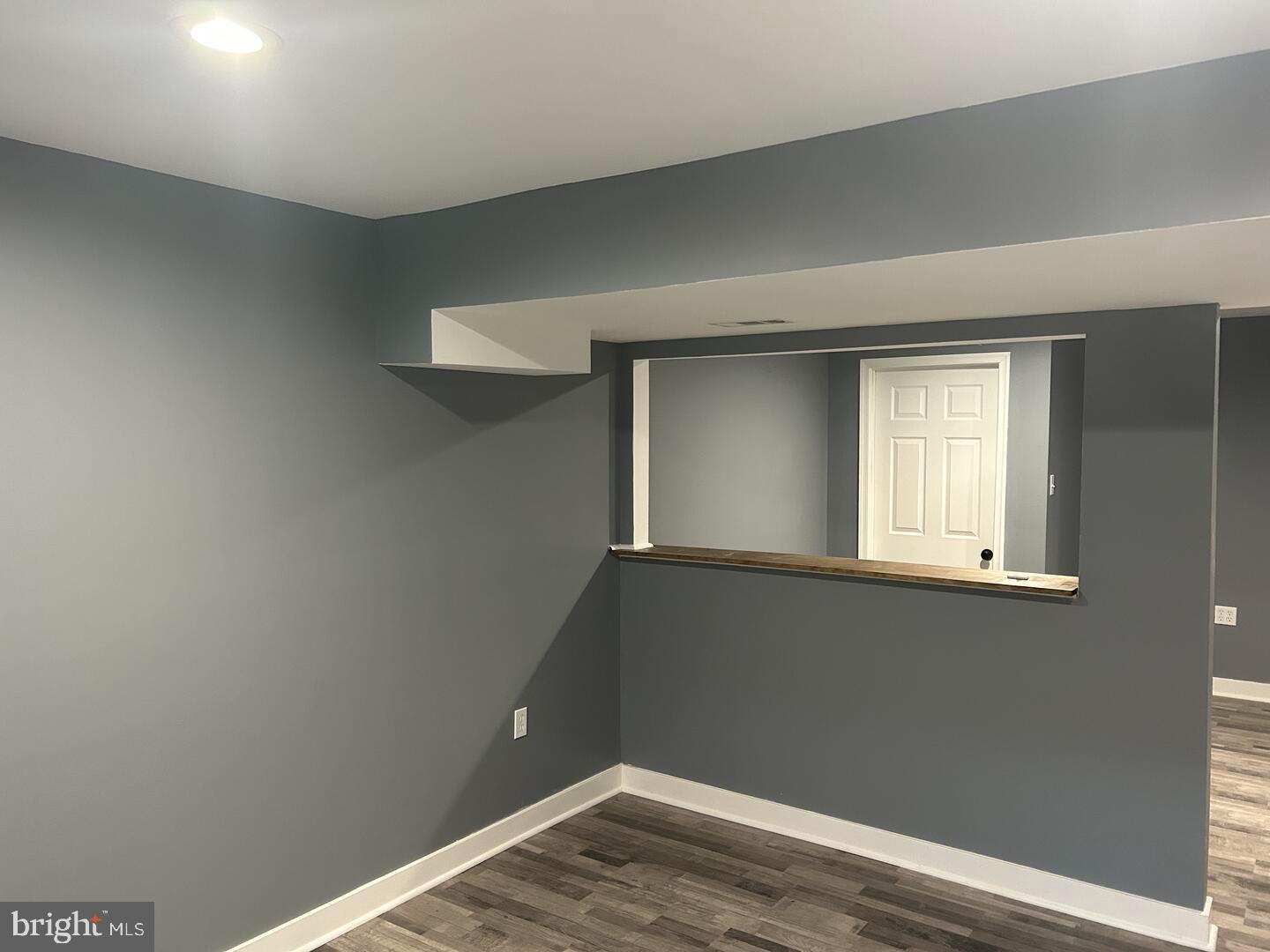 224 Lady Bug Drive Dover, DE 19901 - Photo 5 of 13 a view of a small space with wooden floor and a window