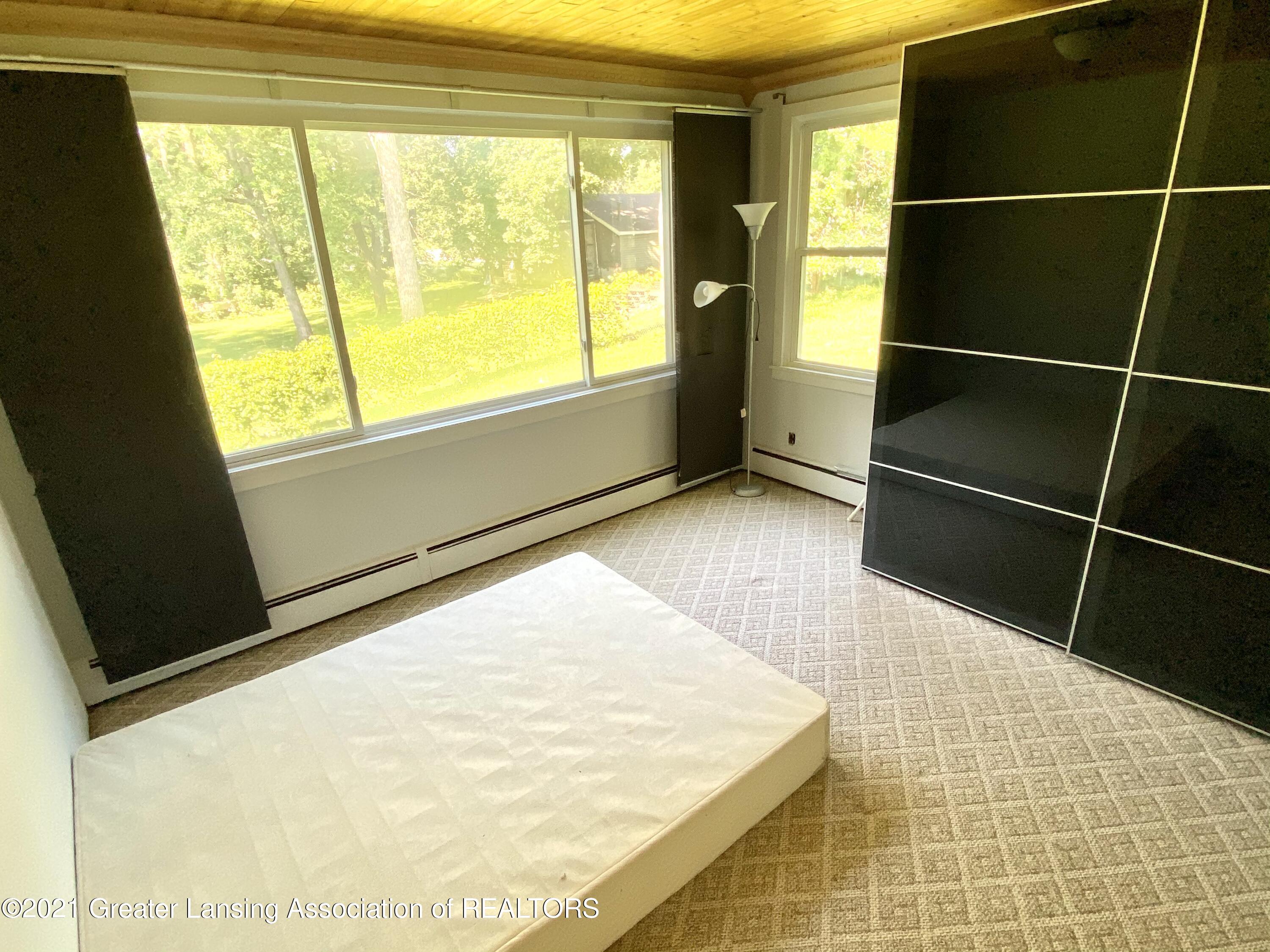 16074 Brook Road Lansing, MI 48906 - Photo 19 of 40 Master bedroom