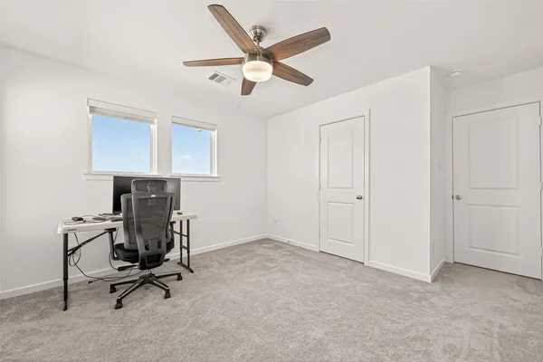 a view of workspace with lounge chair