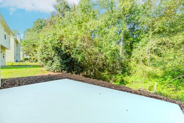 a view of a yard with an outdoor space