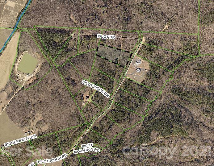 481 Pilot Ridge Road, Unit 27 Nebo, NC 28761 - Photo 2 of 32 a aerial view of a house with a yard