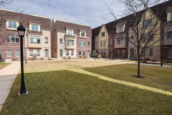 a street view with tall buildings