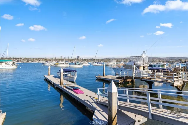a view of a terrace with wooden floor and city view