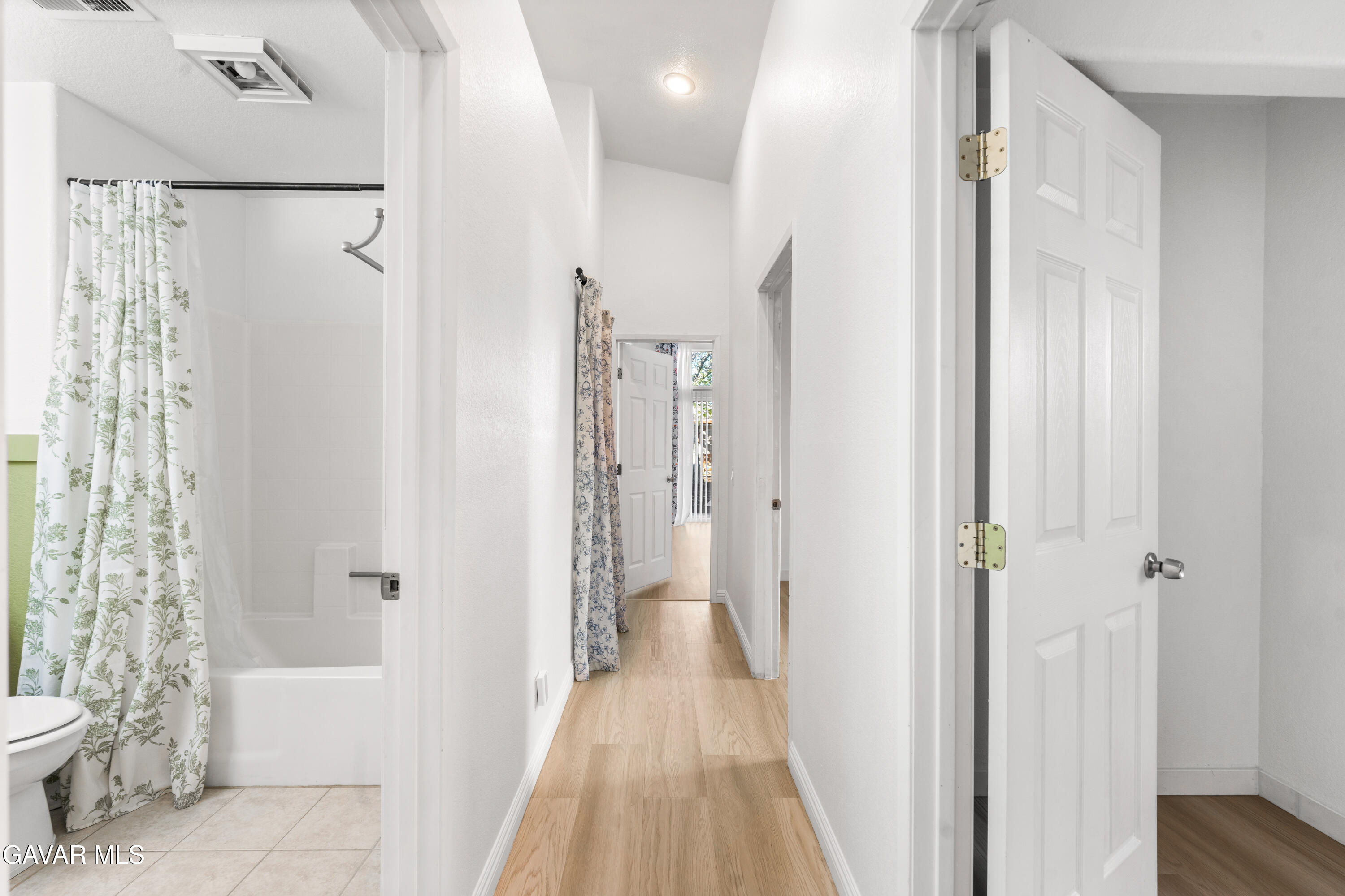 1639 East Kettering Street Lancaster, CA 93535 - Photo 18 of 35 a view of a bathroom from a hallway