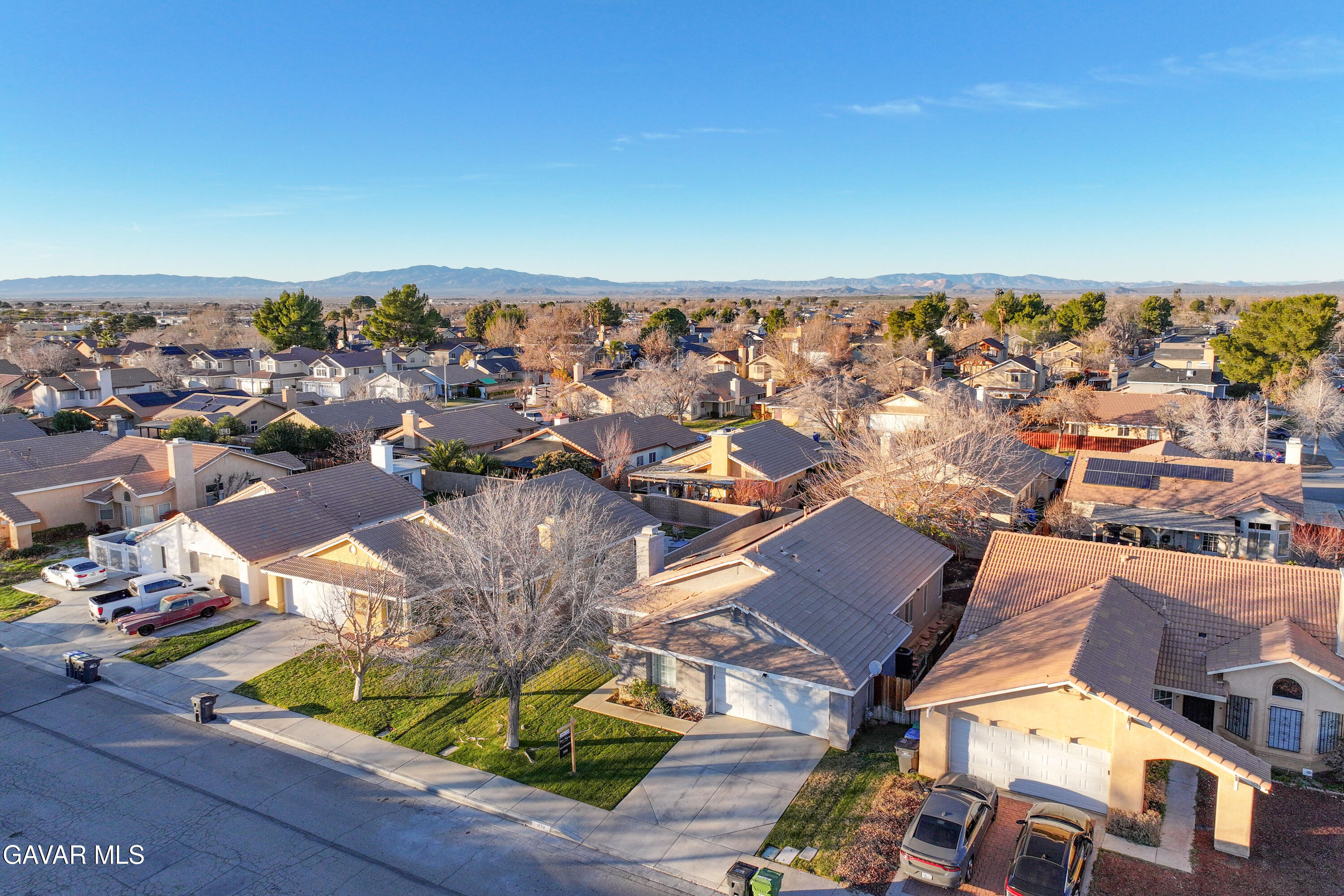 1639 East Kettering Street Lancaster, CA 93535 - Photo 33 of 35 an aerial view of residential houses with outdoor space