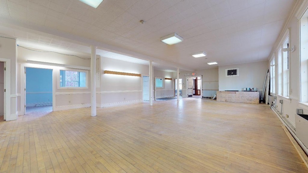 3 Great Pond Road North Andover, MA 01845 - Photo 4 of 14 a view of empty room with wooden floor