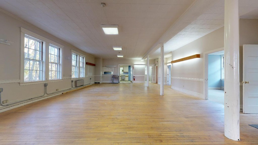 3 Great Pond Road North Andover, MA 01845 - Photo 5 of 14 a view of empty room with wooden floor