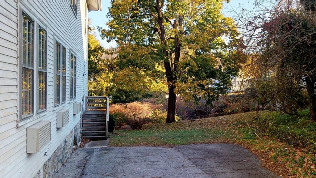 3 Great Pond Road North Andover, MA 01845 - Photo 9 of 14 a view of a pathway of a house with a yard