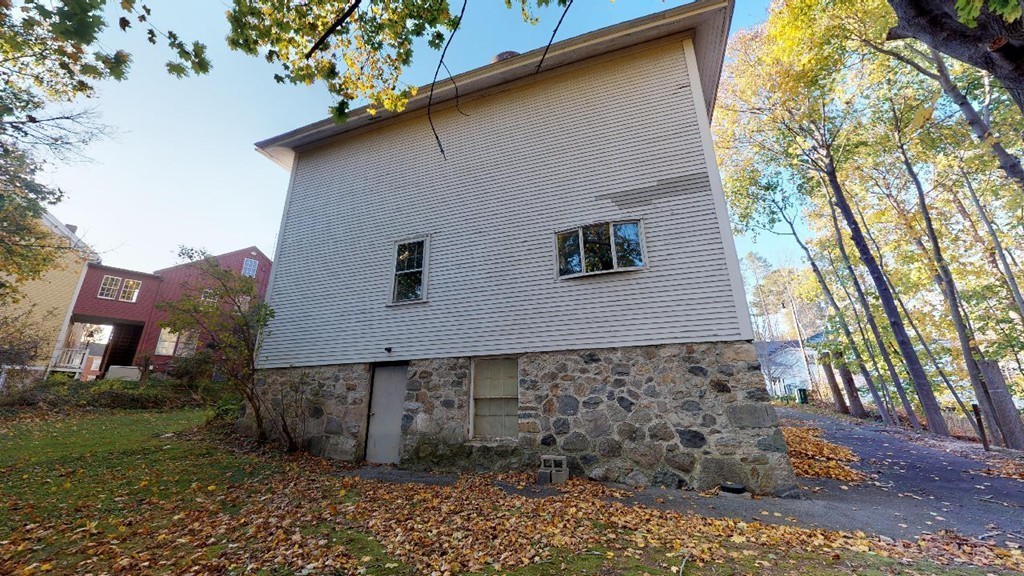 3 Great Pond Road North Andover, MA 01845 - Photo 10 of 14 a front view of a house with garden