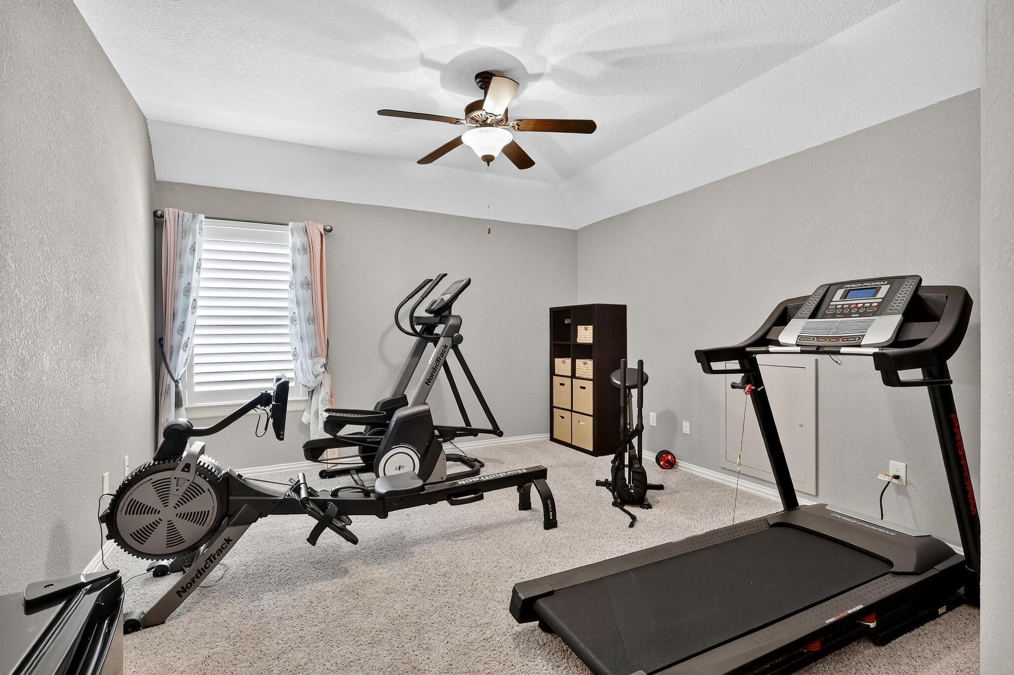 25803 Heritage Maple Drive Spring, TX 77389 - Photo 33 of 46 a view of a room with gym equipment