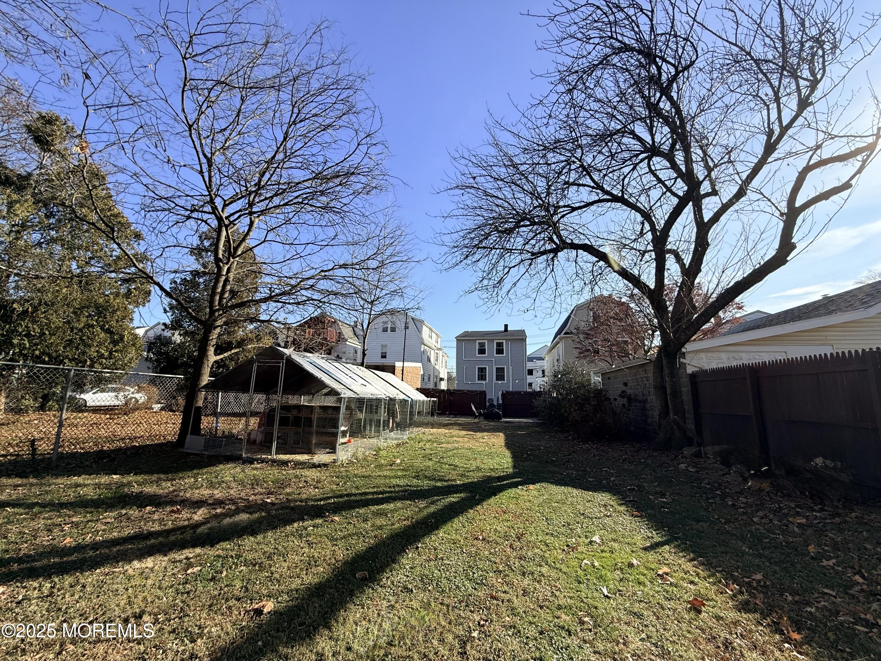 48 Broughton Avenue Bloomfield, NJ 07003 - Photo 26 of 27 a front view of a house with garden
