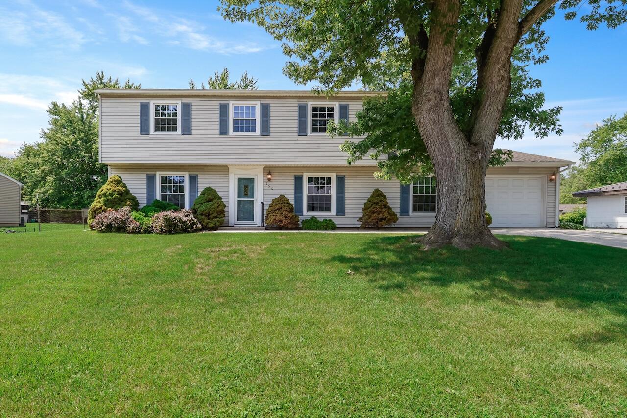 750 Fremont Road Valparaiso, IN 46385 - Photo 1 of 25 a front view of a house with a yard