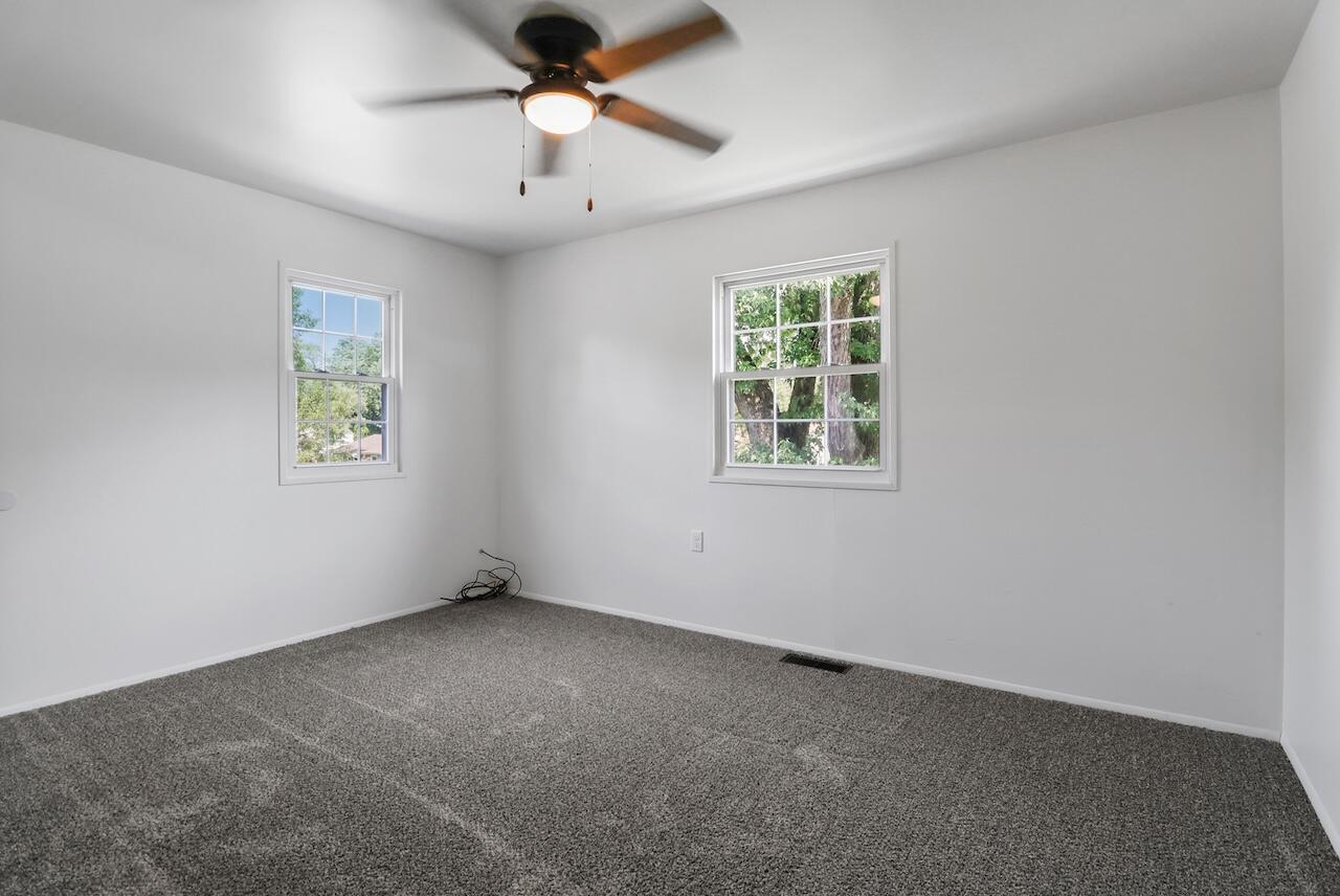 750 Fremont Road Valparaiso, IN 46385 - Photo 14 of 25 an empty room with a window and a fan