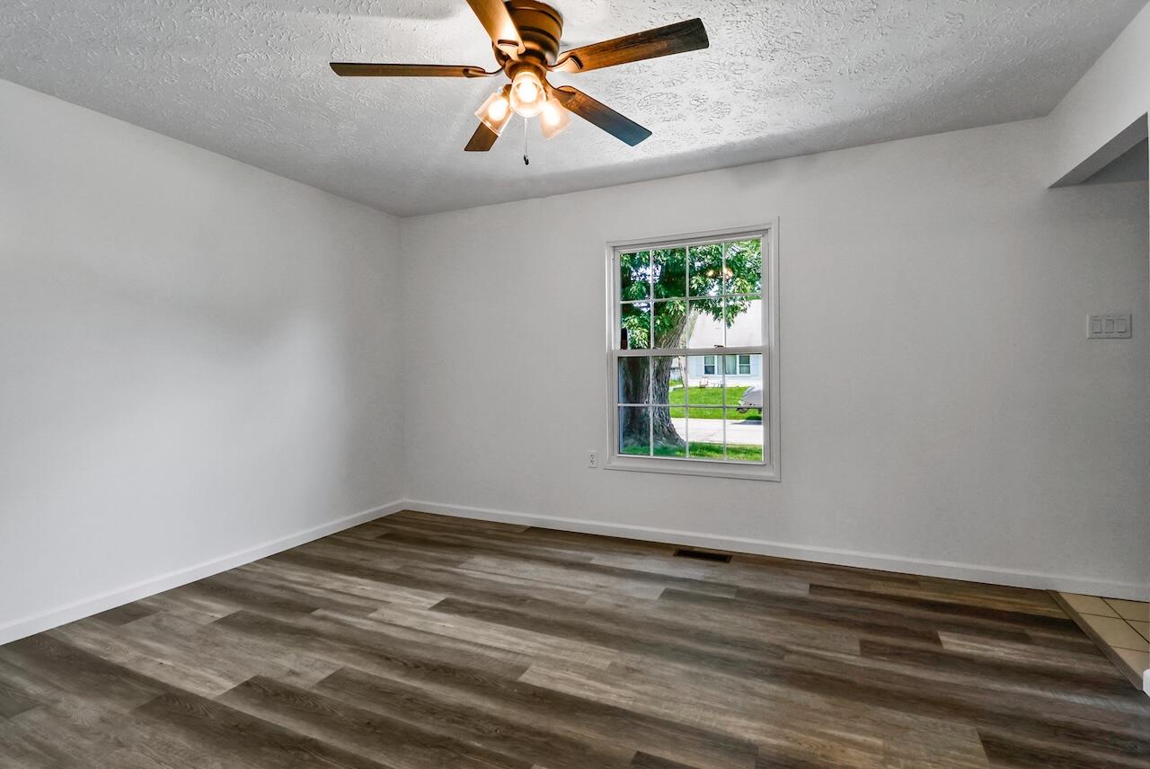 750 Fremont Road Valparaiso, IN 46385 - Photo 5 of 25 a view of empty room with window and ceiling fan