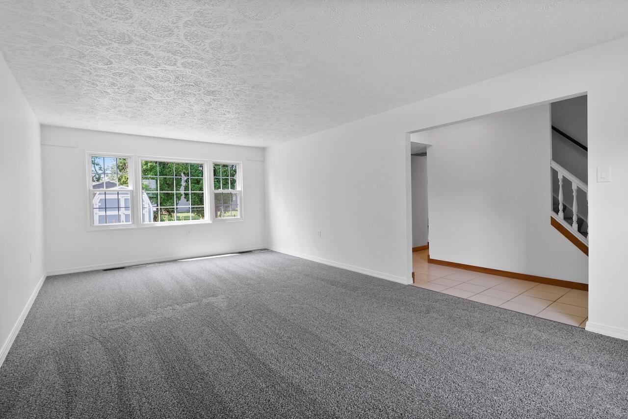 750 Fremont Road Valparaiso, IN 46385 - Photo 6 of 25 a view of an empty room with a window