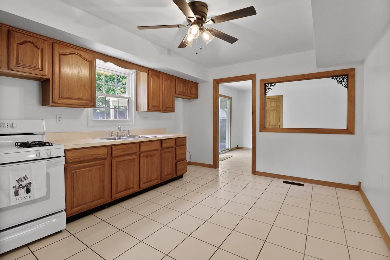750 Fremont Road Valparaiso, IN 46385 - Photo 8 of 25 a view of a kitchen with electric appliances