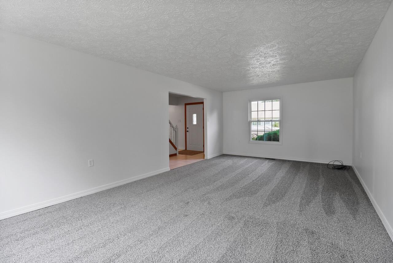 750 Fremont Road Valparaiso, IN 46385 - Photo 10 of 25 an empty room with windows and closet