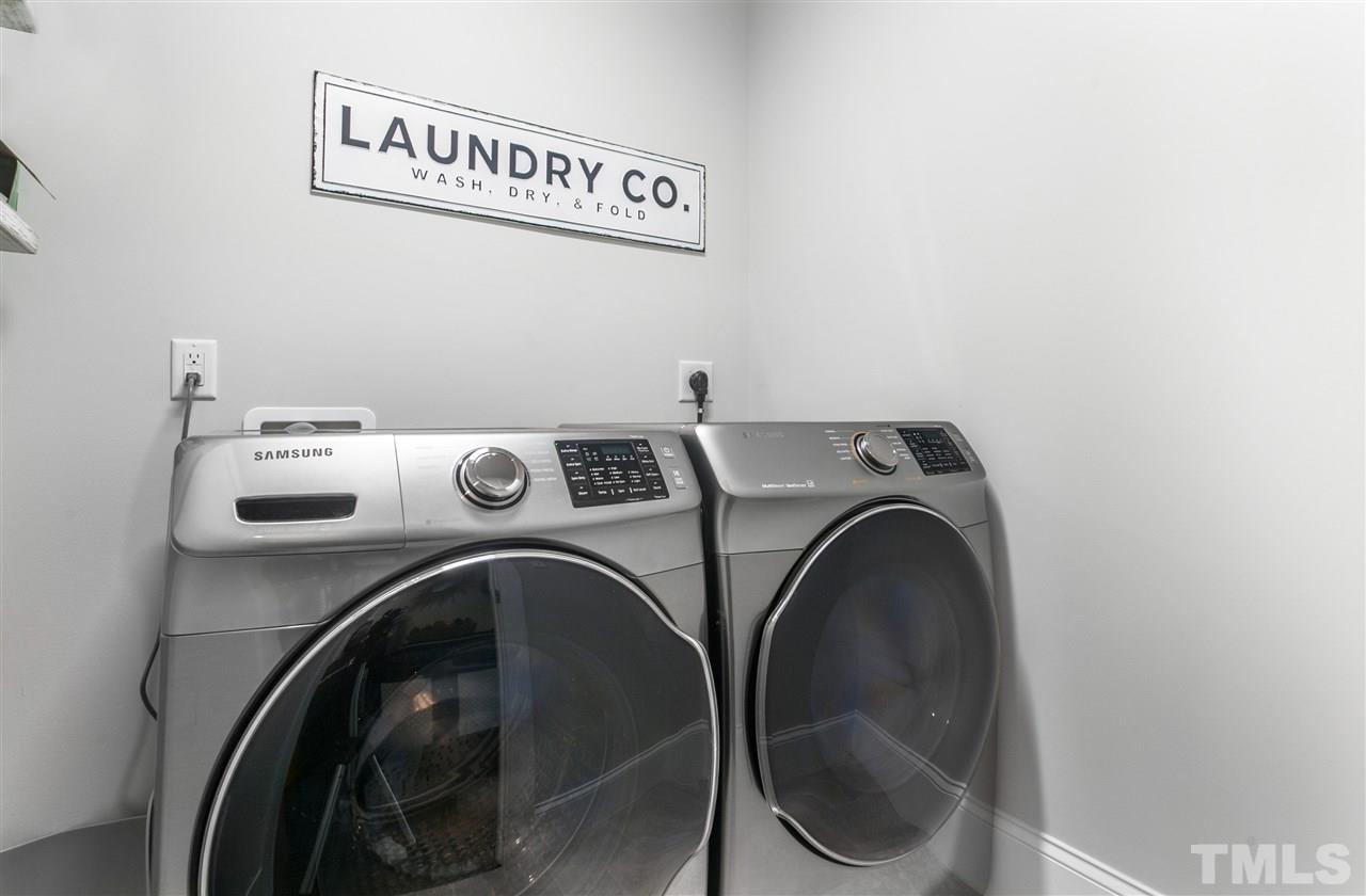 12 Hill Street Raleigh, NC 27610 - Photo 24 of 30 a utility room with dryer and washer