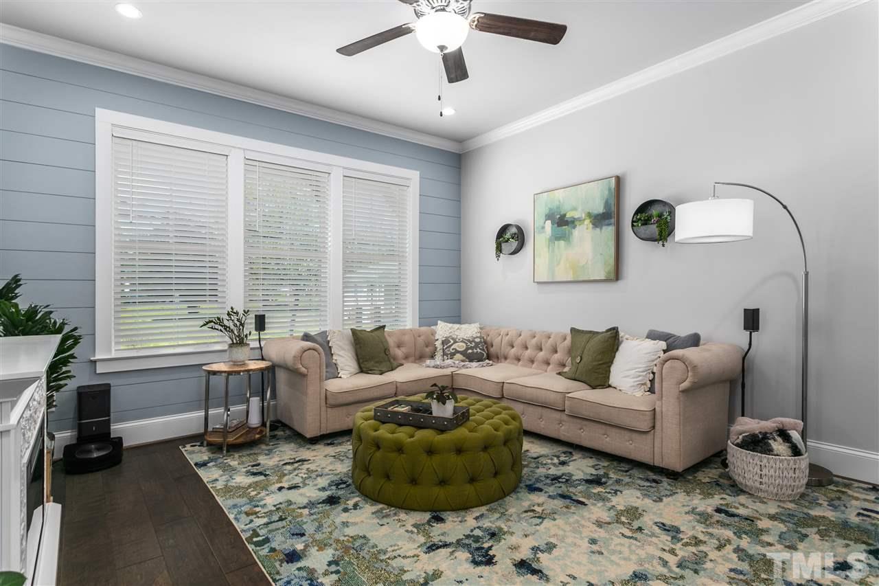12 Hill Street Raleigh, NC 27610 - Photo 5 of 30 a living room with furniture and a large window