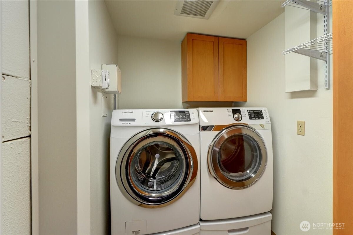 1 North Stadium Way, Unit 16 Tacoma, WA 98403 - Photo 19 of 39 a utility room with dryer and washer