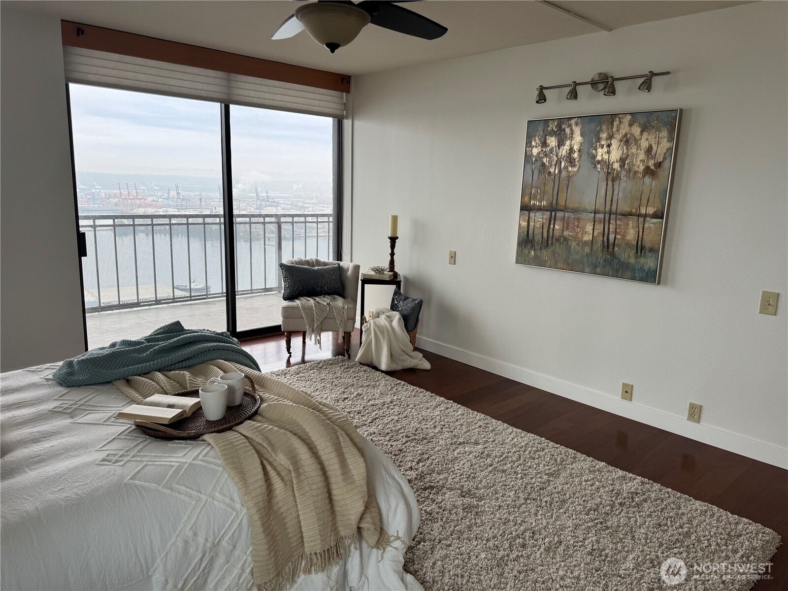 1 North Stadium Way, Unit 16 Tacoma, WA 98403 - Photo 23 of 39 a bedroom with a bed and glass window