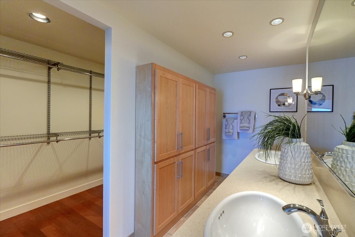 1 North Stadium Way, Unit 16 Tacoma, WA 98403 - Photo 24 of 39 a kitchen with a refrigerator and countertop