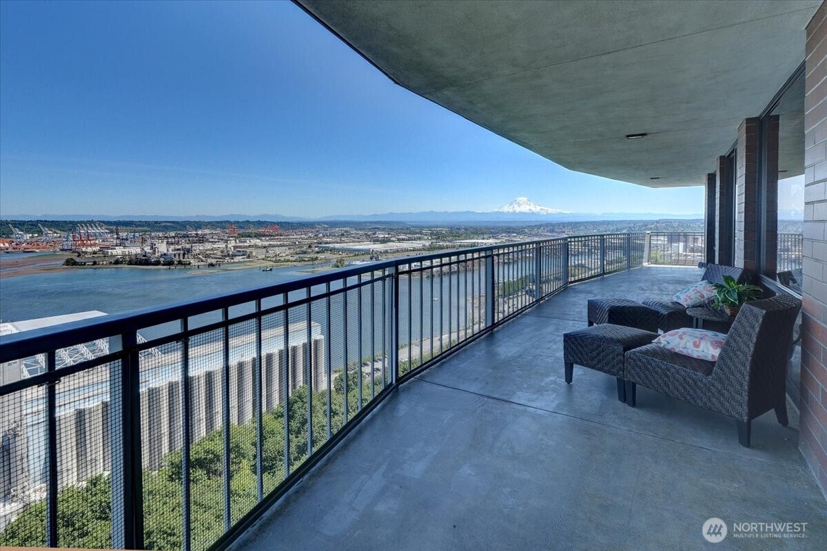 1 North Stadium Way, Unit 16 Tacoma, WA 98403 - Photo 28 of 39 a balcony with furniture and city view